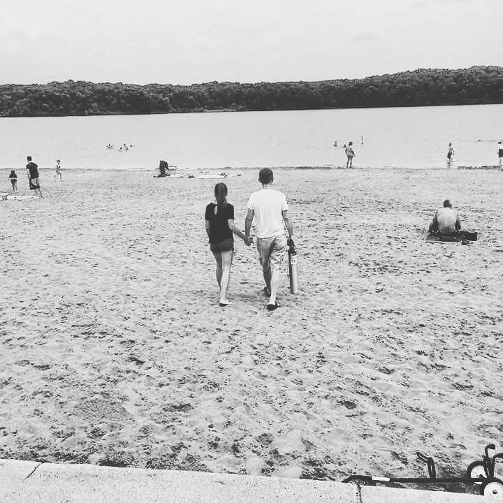 Author and husband wander together to lake at Fort Custer State park.